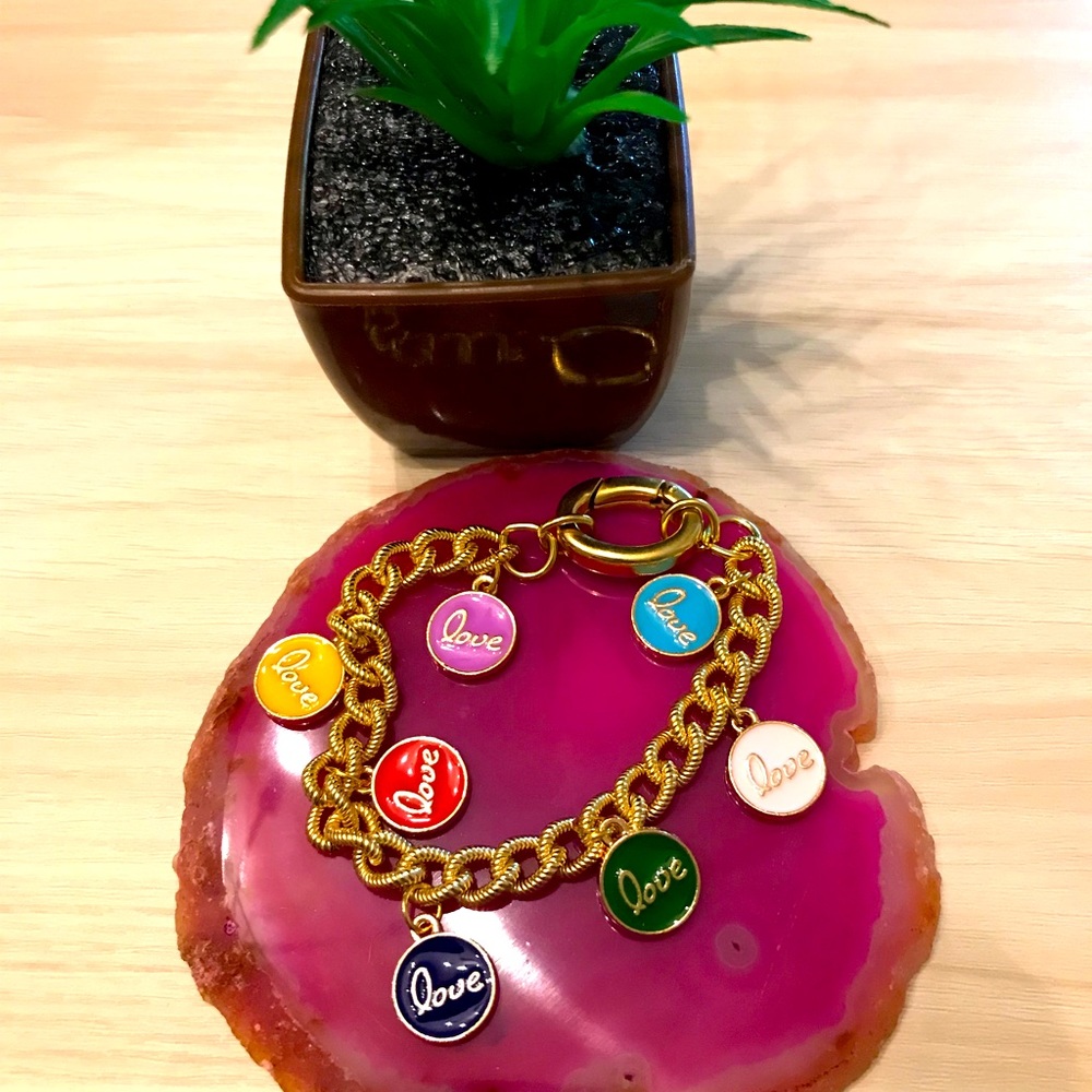 One-of-a-kind hand made bracelet with enamel pendants.
